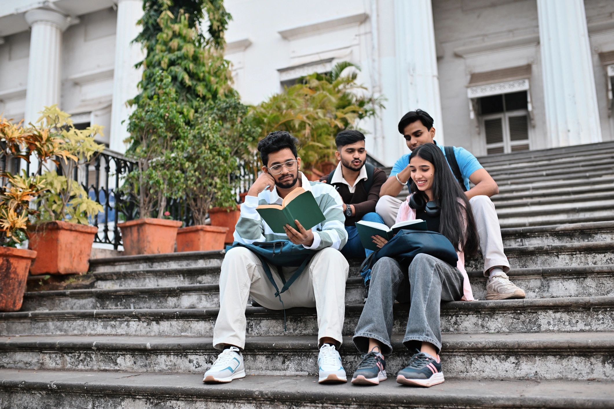 Students discussing study notes together